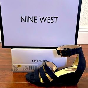 Nine west navy man made upper and insole.  Wedge 3”.